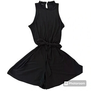 Nik & Nash sleeveless, belted mini romper in black . Size L